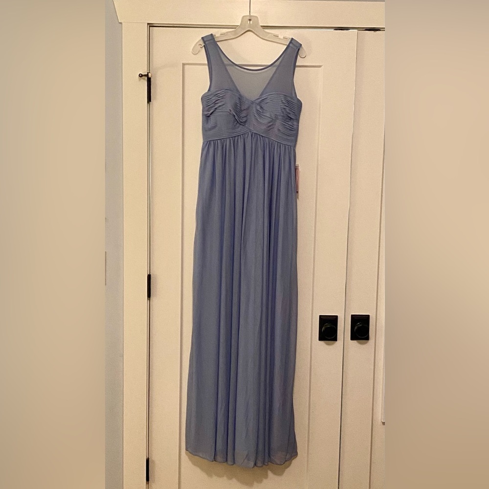 Brand new Dusty Blue dress. Never been worn. Has pockets. Is baby bump friendly.